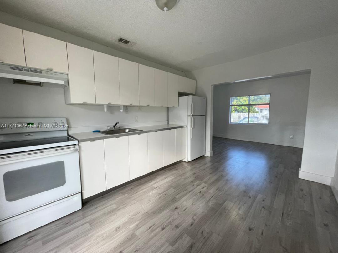 HARWOOD VILLAGE - Residential Income