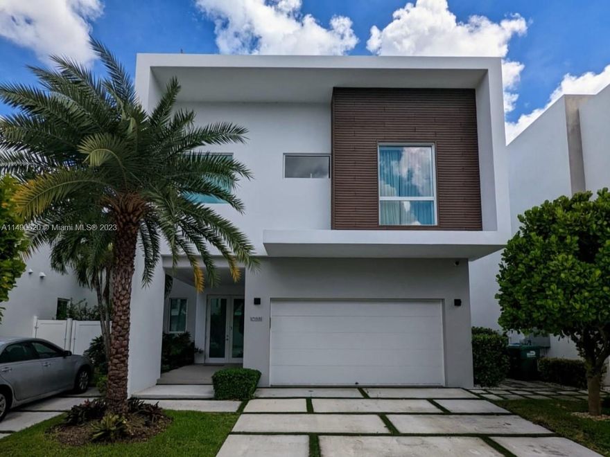One of a kind prestigious home, located at the most exclusive gated community, The Mansions at Doral. Featuring  5 bedrooms, 4 full bath and 1 1/2 baths. This spectacular property features upgrades that include enhanced luminaries creating a luxurious and cozy environment. 100% smart home with smartphone control, fully automated, security cameras, high impact windows and doors; electric shades & California closets in all rooms. Built-in outside kitchen and grill. Appointment only with 24-hour notice, please text listing agent. A must see home!