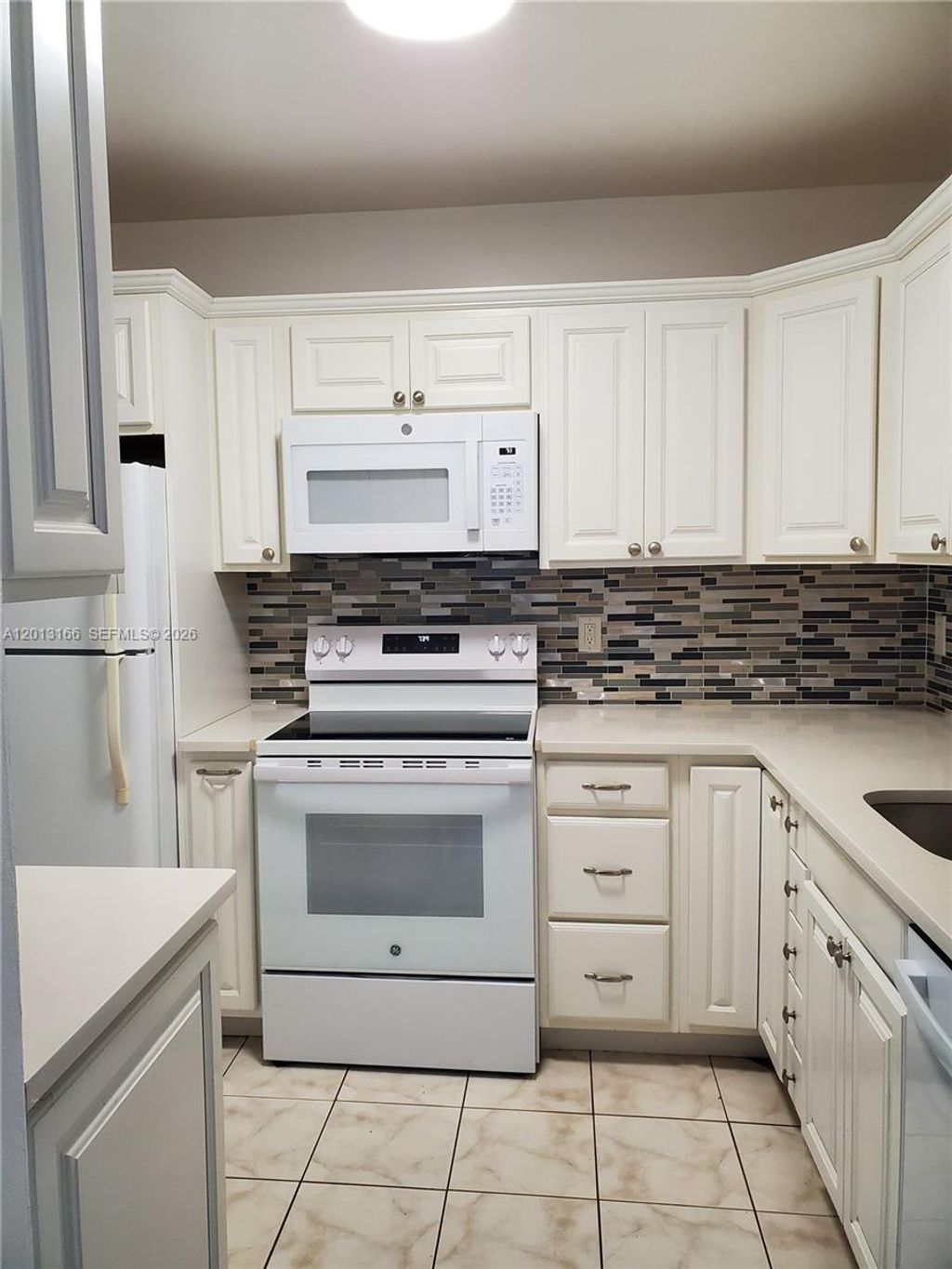 Photo of 1450 Atlantic Shores Blvd #101, Hallandale Beach, FL 33009 (MLS # A12013166)