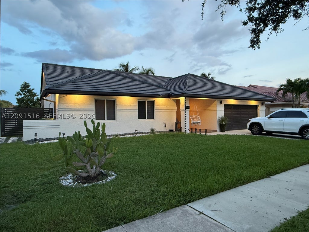 Photo of 1035 NW 164th Ave #0, Pembroke Pines, FL 33028 (MLS # A12091516)