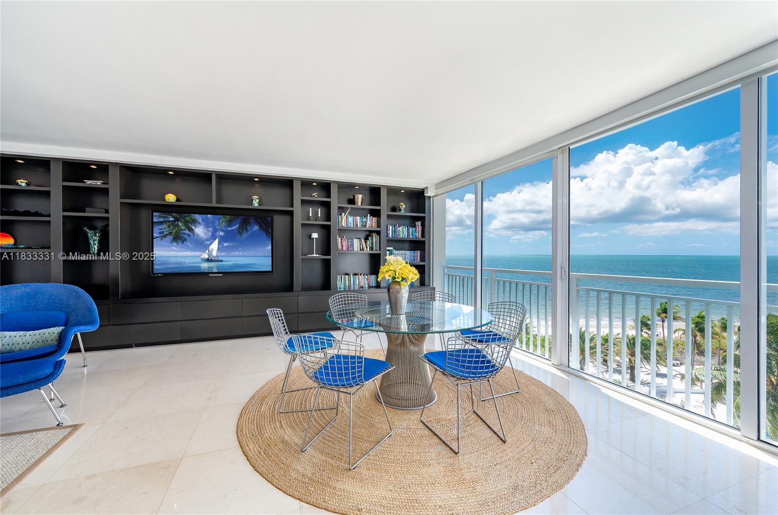 The Sands of Key Biscayne is situated adjacent to Ritz Carlton Hotel with wellness center, tennis, pickle and paddle facilities and restaurants. This 2 bed, 2 bath flat is located directly on the beach in Key Biscayne's most sought after boutique building. Large living room with impact sliding doors allow for a breathtaking Atlantic ocean experience. A gourmet kitchen with center island face the ocean. Museum style recessed lights throughout to control the mood. Deluxe 70 inch HD Sharp TV flush mounted in beautiful custom bookcases. New A/C unit. Heated pool, beach umbrella service, gym, BBQ areas and guard gate all set in a 6 acre botanical garden located directly on the beach of Key Biscayne! Enclosed balcony allows for extra great room Sq. footage. Housekeeping 3x per month.