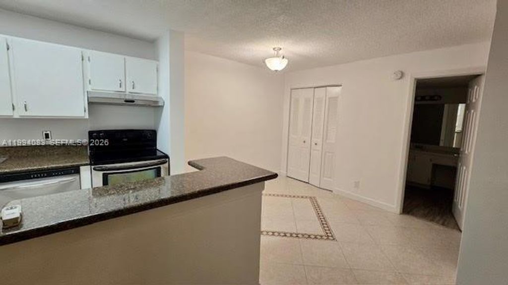 Photo of 10741 Cleary Blvd #204, Plantation, FL 33324 (MLS # A11994083)