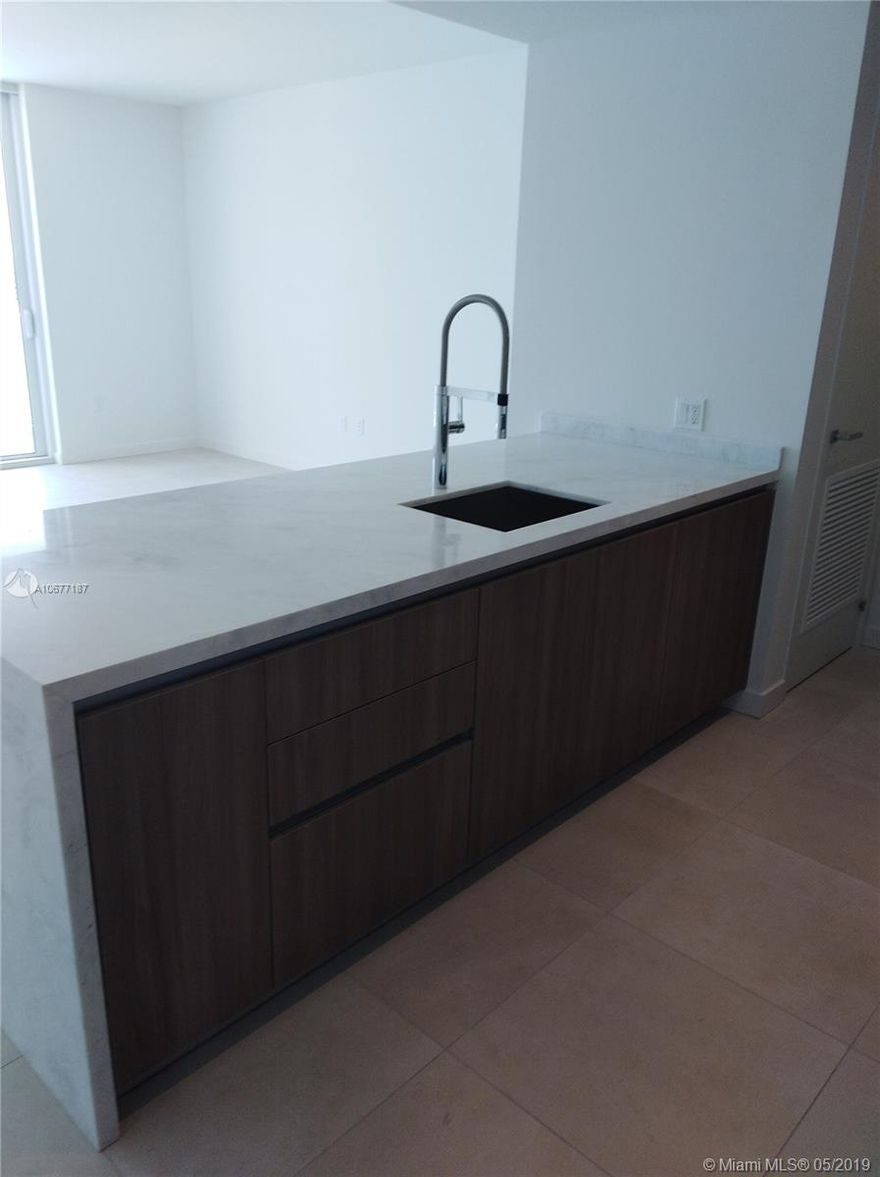 Amazingly Located one block from the beach and restaurants this 2018 Building and unit has Spectacular Intracoastal and Ocean Views from an extra large balcony, Modern style design. Large (over a 1,000 sq. ft.) 1Bed plus den and 1 luxury bathroom, unit presents Italian kitchen cabinets, top of the line appliances, kitchen with quartz and stainless steel appliances, full-size washer & dryer inside the unit, 24/7 valet, lobby service, fitness center, pool with Intracoastal views, pet friendly, area is expanding very fast. Easy to show Seller willing to negotiate.
