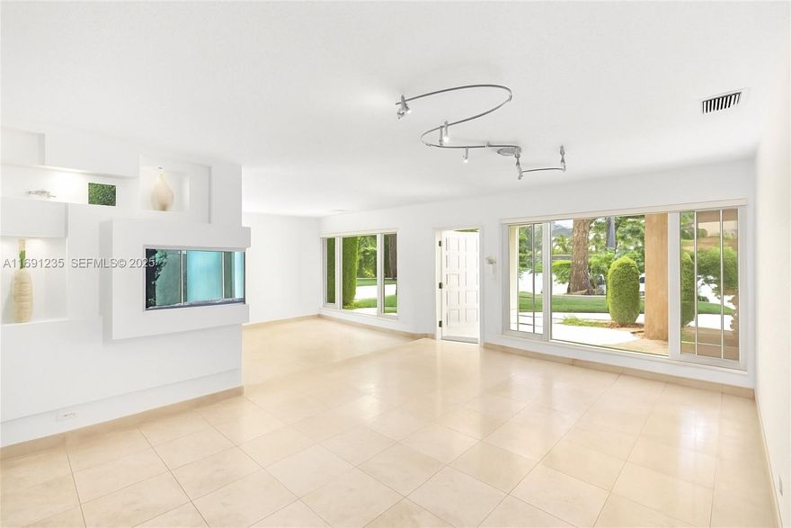 Exceptional corner home in Surfside, located just in front of multi-million-dollar waterfront estates and within walking distance to the beach. Set on a desirable oversized corner lot, this residence offers more space and privacy than typical neighborhood homes. The beautifully maintained and partially remodeled 3/2 features a bright Florida Room filled with natural light, plus a fully equipped kitchen with an open pass-through to the dining area. A thoughtful layout places all bedrooms and bathrooms in a private, separate wing for added tranquility. The spacious garage provides rare potential, with plumbing for a bathroom and laundry room and a separate side entry—ideal for converting into an office, guest suite, or extra bedroom. Outdoors, enjoy a sparkling pool, soothing Jacuzzi, summer kitchen, and a large covered terrace perfect for relaxing or entertaining. With a 2019 roof and quality upgrades throughout, this home combines comfort, style, and prime location. Strong appreciation, high rental demand, and limited inventory also make it an excellent investment with solid long-term ROI potential.