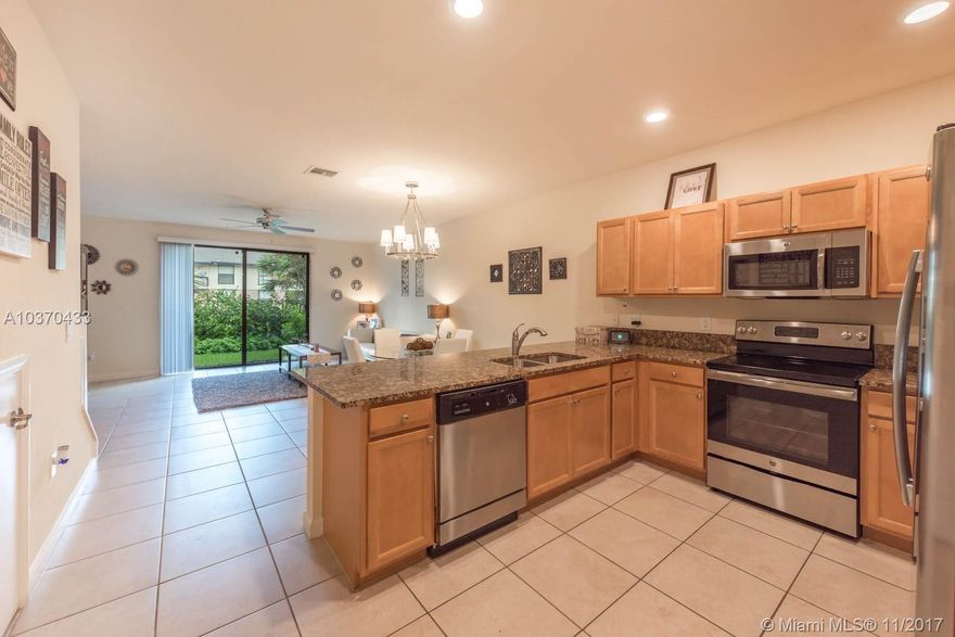 COME AND VIEW THIS SPECTACULAR CAMDEM MODEL TOWNHOME IN THE NEWEST TOWNHOME DEVELOPMENT IN THE CITY OF TAMARAC. BUILT BY LENNAR IN 2016, THIS MODEL TOWNHOME IS FEE SIMPLE AND BOASTS A WIDE OPEN FLOOR PLAN WITH A PATIO IN THE BACK. FEATURING GRANITE COUNTER TOPS, GE STAINLESS STEAL APPLIANCES, 9 FT CEILINGS THROUGHOUT, SINGLE CAR GARAGE AND PARKING FOR 2 CARS IN THE DRIVEWAY. THE BEDROOMS ARE NICELY APPOINTED WITH TONS OF SPACE! OTHER NOTABLE FEATURES INCLUDE A TANKLESS WATER HEATER, STATE OF THE ART AC WITH BLUE TOOTH AND WIFI, USB HOOKUP IN THE KITCHEN. CHELSEA PLACE IS A BOUTIQUE COMMUNITY WITH ONLY 68 TOWNHOMES, A GREAT POOL AND HOT TUB AREA ALONG WITH A TOT LOT FOR THE KIDS. VERY LOW HOA AND CITY TAXES. NO CD TAX!! NOW LISTED UNDER MARKET VALUE. ITS A GREAT BUY!!!!!!!