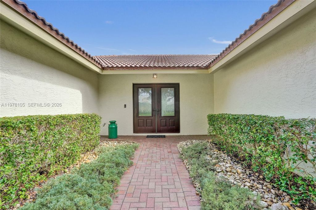 Photo of 5093 NW 86th Way, Coral Springs, FL 33067 (MLS # A11978105)