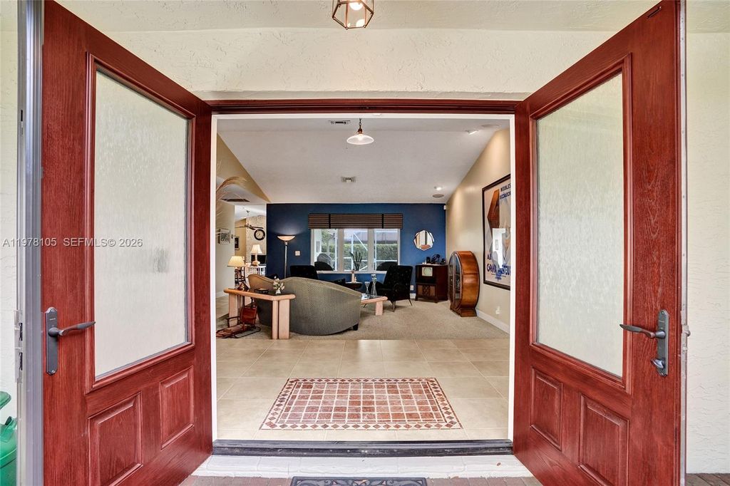 Photo of 5093 NW 86th Way, Coral Springs, FL 33067 (MLS # A11978105)