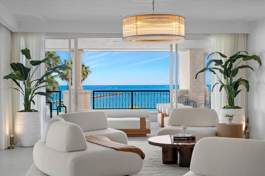 Step onto the pristine sands of Fisher Island and embrace oceanfront living! This newly renovated  masterpiece showcases 3 bedrooms, 4.5 baths and 3,959 sq ft of elegantly designed interior. Features include: a gourmet kitchen with Viola marble countertops, a rolling center island, custom-designed bathrooms & closets, French oak wood and micro cement floors, upscale lighting, waterwork brass fixtures, impact glass doors and many more improvements. Indulge yourself with breathtaking views of the Atlantic Ocean and Miami Beach in this expansive wraparound terraces encompassing 1,721 sq ft perfect for entertaining! The principal suite includes dual walk-in closets and bathrooms with spa-inspired baths. Live the Fisher Island lifestyle in this exceptional offering! Easy to show.