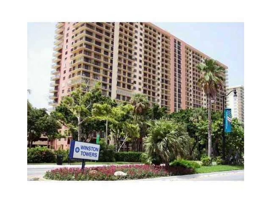 Across the street from sunny isles beach! Enjoy prestige sunny isles city from this large split plan condo.  Ocean view from this fully furnished unit, 2 spacious bedrooms and 2 full baths, 2 car garage and laundry inside is a plus. Secured gated building  with tennis courts. Walking distance to restaurants, shops, banks, BEACH and more.