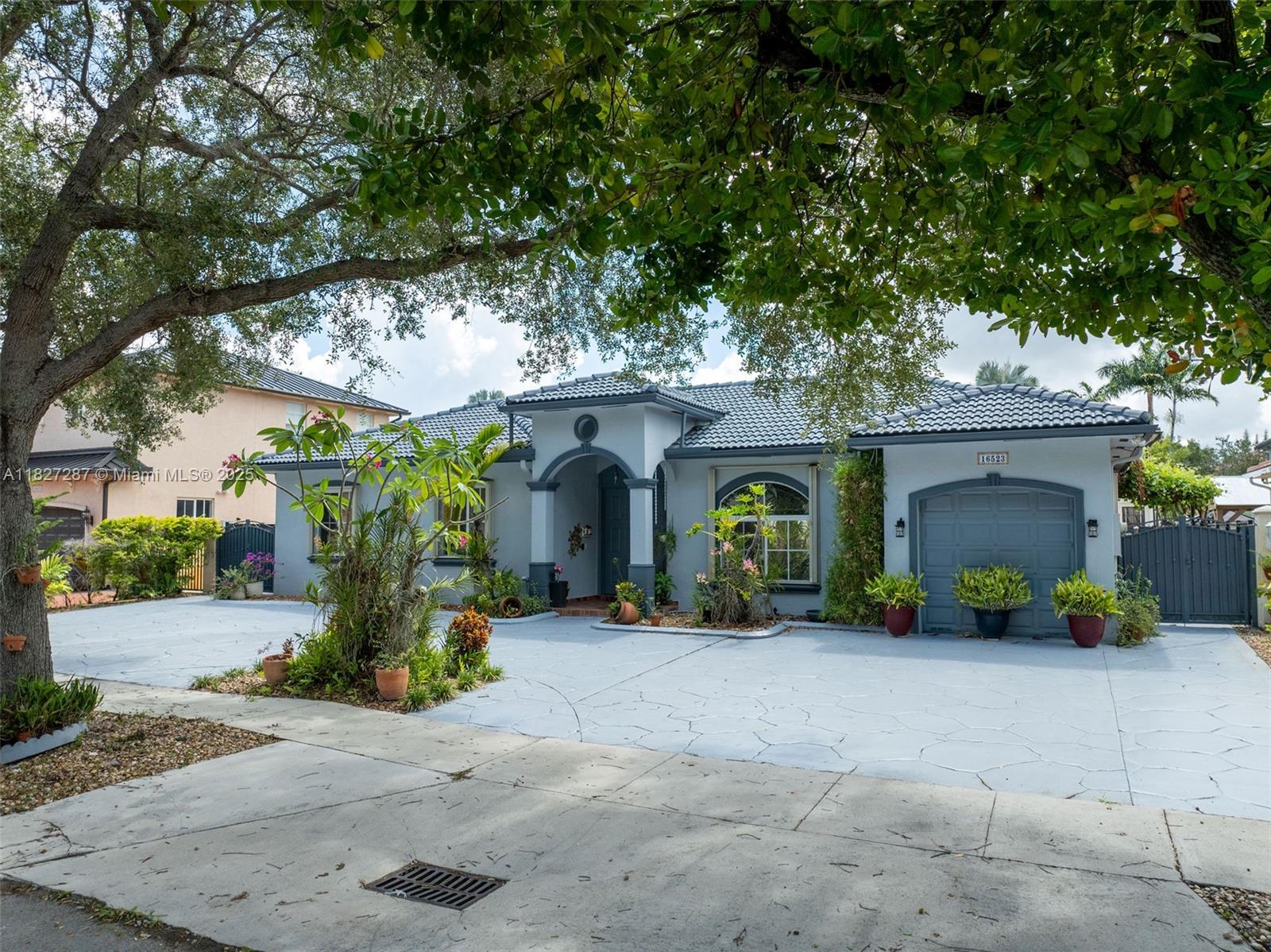 Prime Miami Lakes Location! Nestled in Royal Oaks, a gated community with no HOA, this well-maintained 3-bedroom, 2-bath one-story home features a sleek kitchen with quartz countertops and stainless steel appliances, wood floors, and a spacious primary suite. The converted garage is perfect for a home office or studio. Enjoy the oversized patio with an above-ground pool and screened area—ideal for entertaining. Room to add a pool! 24-hour security, no approval needed, and close to top schools, Main Street, Parks, I-75 & Palmetto.