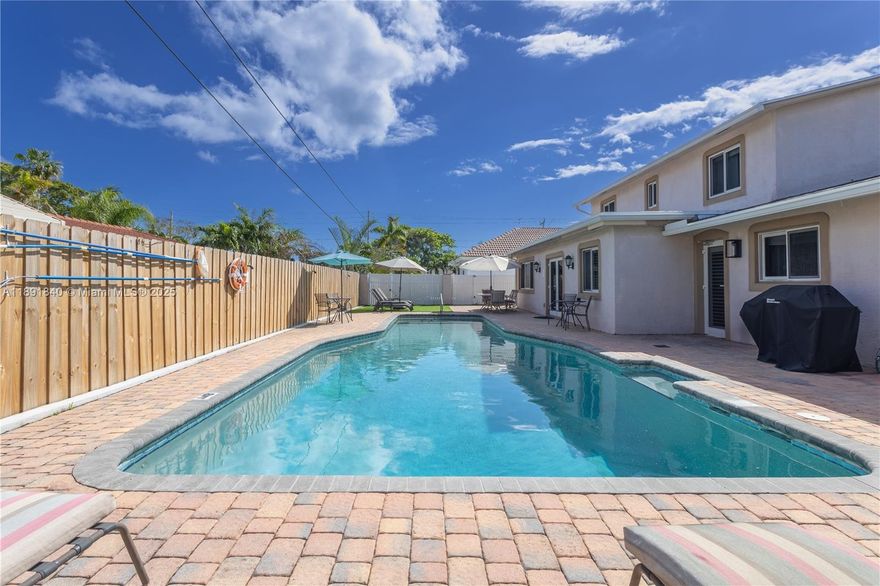 Immediate or Short term, Spacious 5-bedroom, 3-bathroom with a private 45-ft heated saltwater pool and a fully fenced yard in the desirable North Pompano Beach neighborhood—minutes from beaches and shopping! This well-maintained home features an indoor laundry, and impact windows. The kitchen is equipped with SS appliances and ample cabinet space. Inside, porcelain flooring downstairs and vinyl upstairs. Enjoy top-notch entertainment with Roku TV streaming, high-speed internet. 2 A/C units for ultimate comfort. The outdoor space boasts a BBQ area, seating, and ambient lighting. RV and boats are welcome with a 50-ft long circle driveway. East of Federal Hwy 1, just minutes to shopping and restaurants. Price and availability are subject to change. Also available for sale w/ sister property!