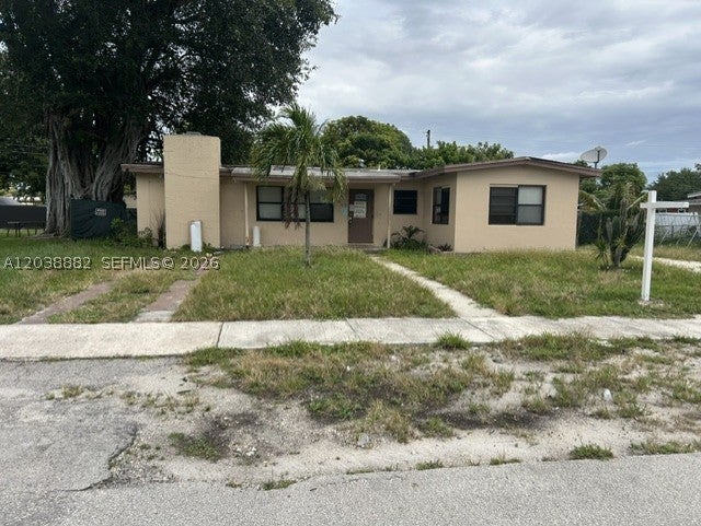 Photo of 1001 NW 13th Ct, Fort Lauderdale, FL 33311 (MLS # A12038882)