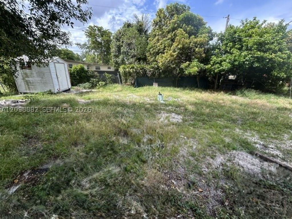 Photo of 1001 NW 13th Ct, Fort Lauderdale, FL 33311 (MLS # A12038882)