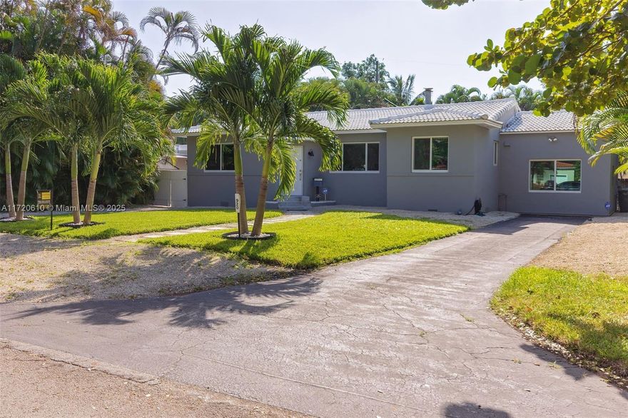 CHARMING 2 BEDROOM + 2 FULL BATH WITH AIR CONDITIONED CONVERTED GARAGE, THIS ADDITIONAL ROOM CAN BE USED AS A 3RD BEDROOM, AN OFFICE, ETC. LOCATED IN QUIET BISCAYNE PARK STREET. LARGE OPEN FLOORPLAN WITH WOOD BURNING FIREPLACE AND BEAUTIFUL COVERED PATIO OFF THE FAMILY ROOM. WOOD AND SLATE FLOORS. RENOVATED KITCHEN WITH BREAKFAST NOOK. FORMAL DINING ROOM WITH FRENCH DOORS. PRIVATE FENCED YARD WITH SEPARATE AREA FOR DOGS, ROOM FOR POOL AS WELL. IMPACT WINDOWS AND DOORS. TANKLESS WATER HEARTER & LAUNDRY ROOM. INSTALLATION FOR ELECTRIC CAR READY, ALL YOU NEED IS THE CHARGE...