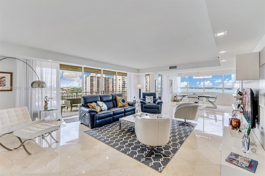 Rarely Available Direct-Bay, 3-Bedroom Corner Unit at Jockey III, One of Miami's Most Desirable Bayfront Communities. Bright Natural Light, High Ceilings + BREATHTAKING WRAP-AROUND VIEWS of Both Bay & City. Fully Remodeled, a Pristine, Well-Loved Unit, Excellence in Details. SPECTACULAR MASTER SUITE WITH CONVERTIBLE MASTER BATH + OVERSIZED WALK-IN CLOSET (Must See!). Expansive Kitchen with SolidWood Cabinets, Stone Counters + High-End Stainless Appliances. Adorable Breakfast Area with GORGEOUS BAY VIEWS. A+ BUILDING, Gated Waterfront Community on 23 acres: 24-Hr Security, Gym, Resort-Style Pool, Jacuzzi, Gym w/ Steam and Sauna Rooms, Complimentary Valet Parking, Tennis Courts and More!  AMAZING LOCATION: Walk to Restaurants, 4 Minute Drive to Whole Foods and Miami Shores Country Club, 16 to Wynwood, 18 to Miami International Airport, 20 to Brickell. CALL NOW!