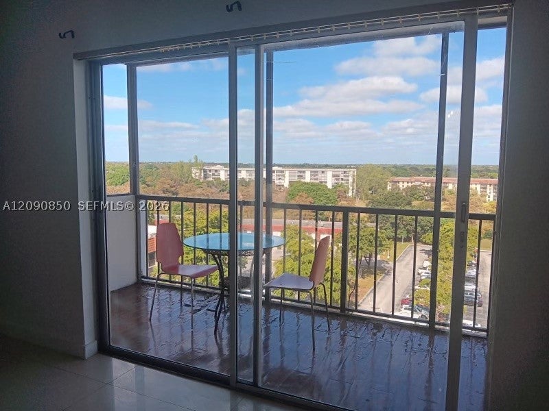 Photo of 4174 Inverrary Dr #1011, Lauderhill, FL 33319 (MLS # A12090850)