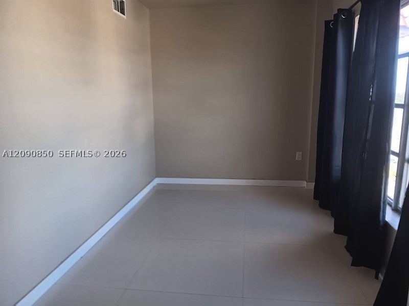 Photo of 4174 Inverrary Dr #1011, Lauderhill, FL 33319 (MLS # A12090850)