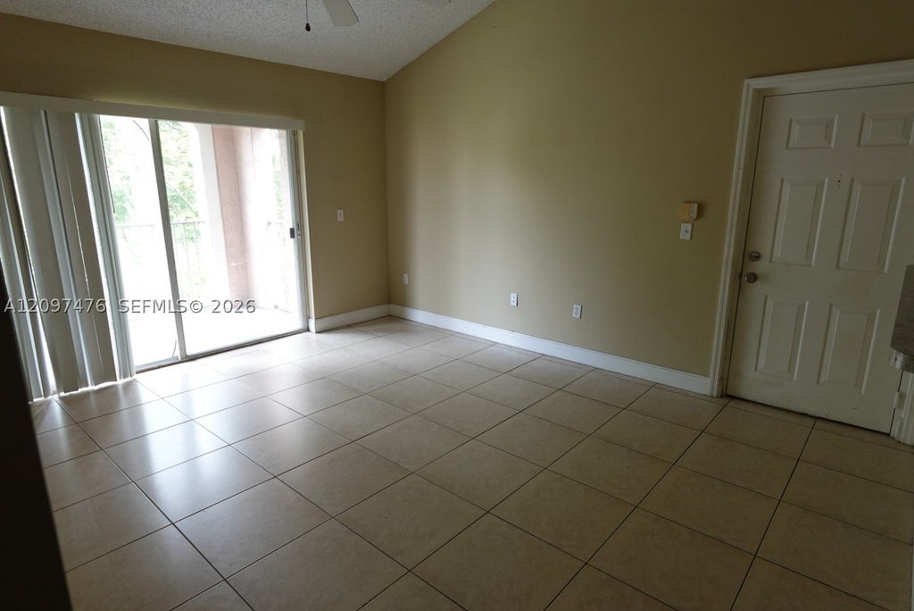 Photo of 12136 Saint Andrews Pl #304, Miramar, FL 33025 (MLS # A12097476)