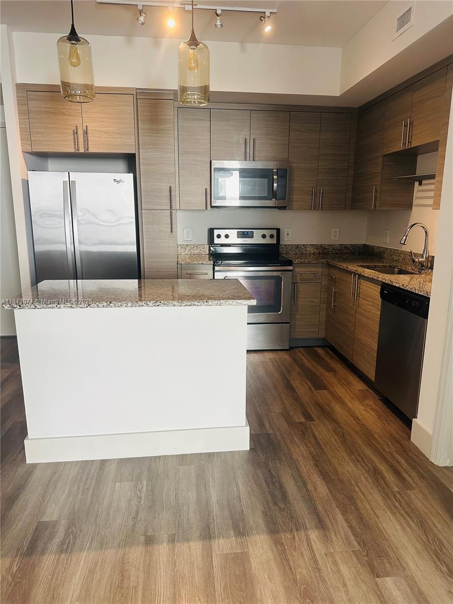 The Queue Apartments - Residential Lease