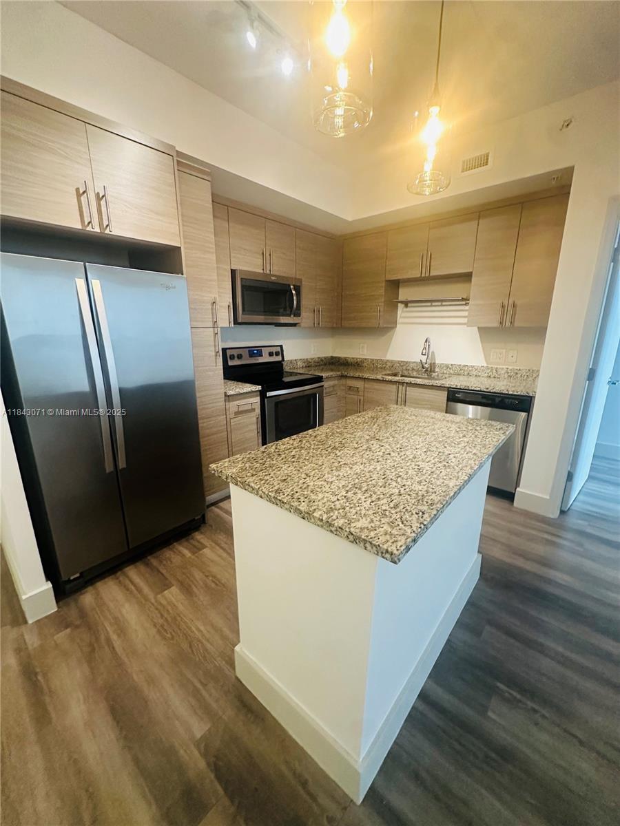 The Queue Apartments - Residential Lease