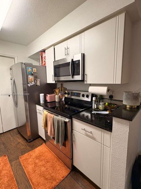 Photo of 833 Riverside Dr #834, Coral Springs, FL 33071 (MLS # A12005576)