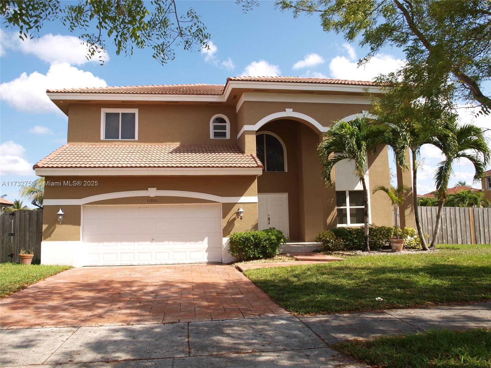Beautiful NEWLY constructed elegant and contemporary 4 bedroom / 3 bathroom home. Grand 14ft ceiling. Dazzling porcelain floors, featuring modern touches, top of the line appliances, walk-in closets, no details were spared. This a family-friendly enclave in an ideal location near the FL Turnpike, restaurants, shopping outlets and A+ school.
