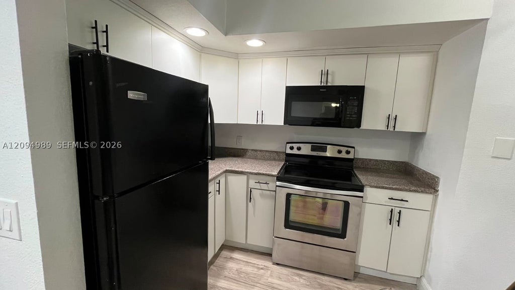 Photo of 701 Vista Isles Dr #1624, Sunrise, FL 33325 (MLS # A12094989)