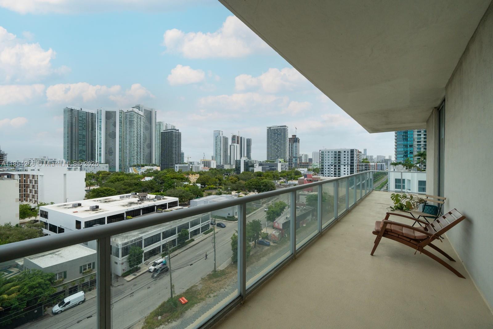 Welcome to 2 Midtown Unit H0911 – a stylish corner 2BD/2.5BA in the heart of Midtown Miami. Floor-to-ceiling windows showcase sweeping city and bay views, while the wraparound balcony offers the perfect spot to relax or entertain. The open layout features a modern kitchen with stainless steel appliances, sleek polished concrete floors, and abundant natural light. Enjoy premier amenities including a grand lobby, fitness center, sauna, steam room, resort-style pool, plunge pools, jacuzzi, kids’ play area, and lounge spaces. Steps to dining, cafés, and shops, minutes to the Design District and Wynwood.