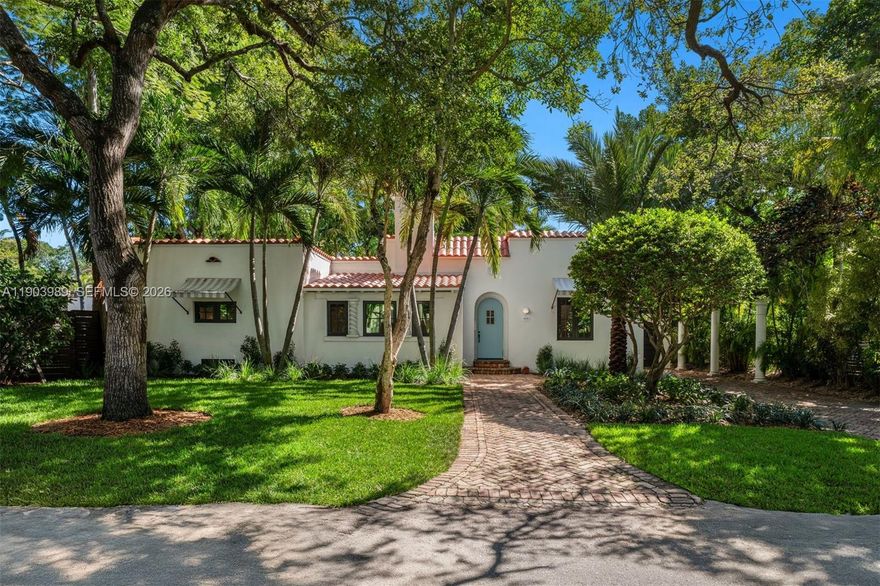 Nestled on a quiet, tree-lined street in North Coconut Grove, this charming Old Spanish–style residence offers 2,615 SF of living space on a 6,888 SF lot. The 4-bed, 3.5-bath home blends historic charm with modern updates, featuring wood-beamed ceilings, European tile and hardwood floors, and impact windows. The open kitchen boasts marble countertops, custom cabinetry, premium appliances and a dedicated breakfast area. Enjoy seamless indoor-outdoor living with sliding doors leading to a lush backyard, wood deck, and pergola. Additional highlights include an office/multipurpose room, laundry room, and carport. Close to bayfront parks, marinas, and the Grove’s vibrant village center.
