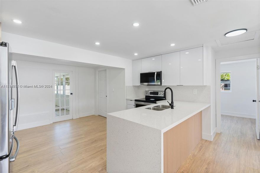 This bright and modern 5-bedroom, 2-bathroom home in West Palm Beach close to Rapids Water Park, making it a perfect choice for those seeking a rental property. Featuring a spacious layout and pool. This home offers convenience, and style in a prime location close to parks, schools, shopping, and dining. Additionally, the property may be slightly larger than the living area reflected in the property appraisal.