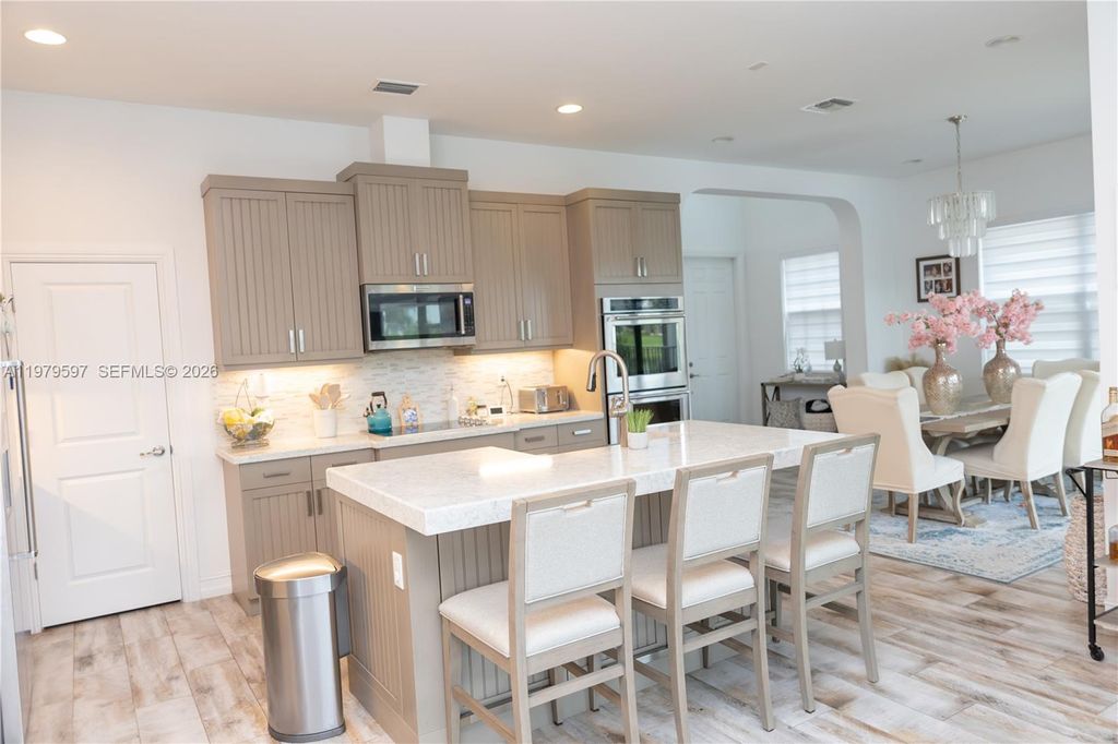 Photo of 11826 SW 13th Ct, Pembroke Pines, FL 33025 (MLS # A11979597)