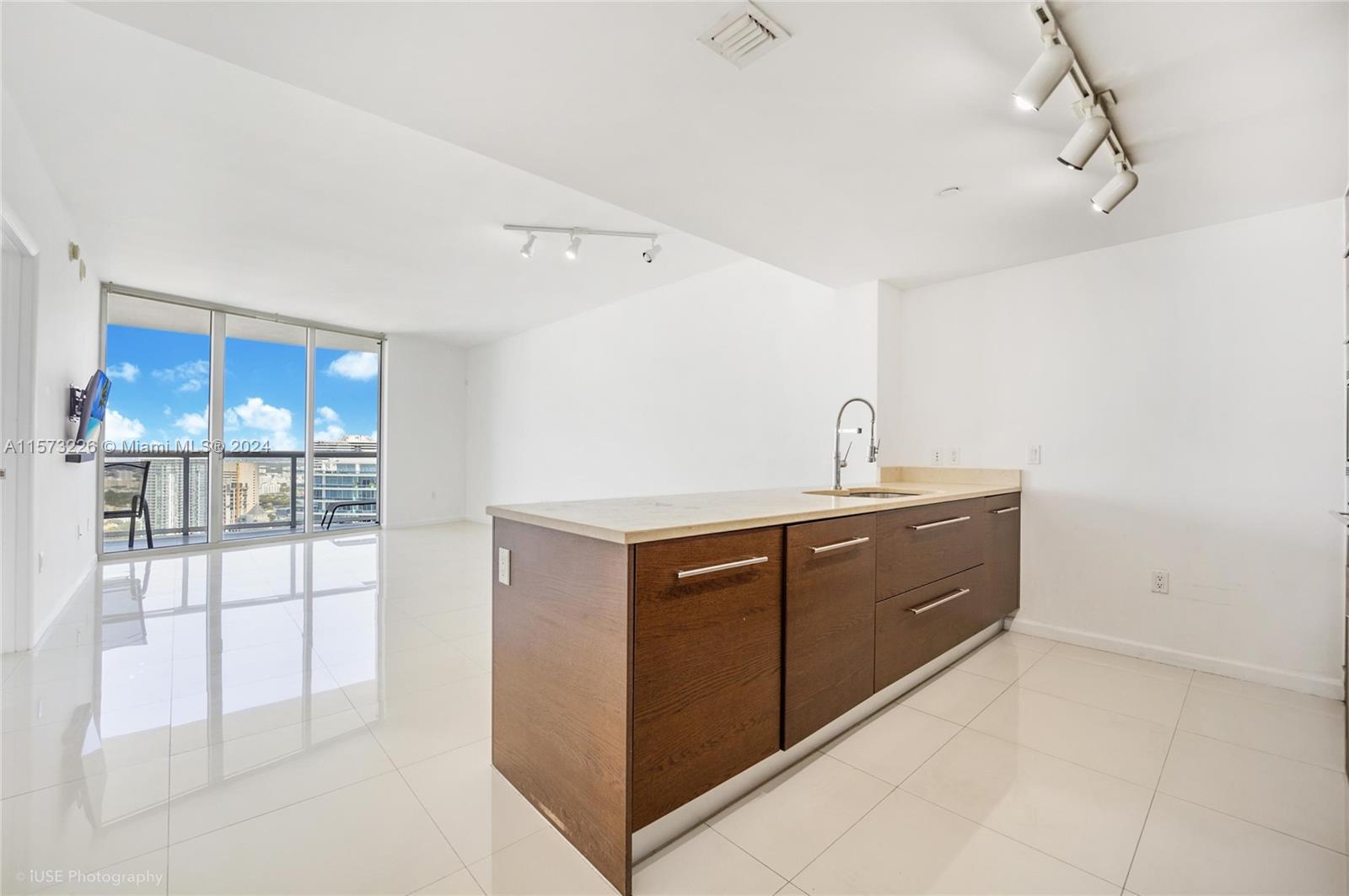 Step into luxury living with this exquisite one-bedroom, one-bathroom lower penthouse condo nestled in the heart of Icon Brickell, Miami's most sought-after address. This meticulously designed residence boasts stunning panoramic views of the city skyline and creating a captivating backdrop for your urban oasis. The spacious living area features floor-to-ceiling windows, flooding the space with natural light and offering unparalleled vistas from every angle. 
With access to world-class amenities including a state-of-the-art fitness center, movie theater, infinity-edge pool, and spa, this penthouse condo offers the ultimate Miami lifestyle experience. Don't miss your chance to call this exclusive residence home.