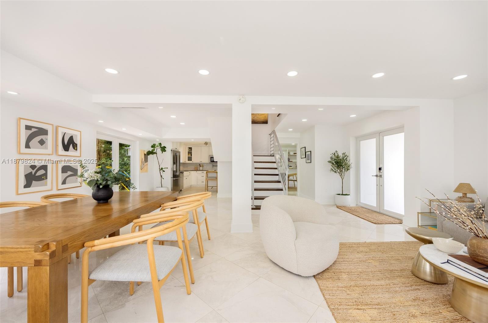 Impeccably remodeled and maintained 3-bedroom, 2.5-bath home in Coral Gables! Features include a spacious open layout, impact windows and doors, updated plumbing and electrical, and a newer roof for peace of mind. Inside, enjoy a mix of elegant marble and warm wood floors, a bright kitchen with upgraded hardware, and electric blackouts in the main suite. Recent updates include fresh paint (inside and out), new landscaping, and added side gates for privacy. Upstairs you'll find all bedrooms plus a generous primary suite. Two-car garage, circular Chicago brick driveway, and room for a lap pool. Ideally located minutes from Miracle Mile, Merrick Park, the Biltmore Hotel, airport, Coral Gables Country Club, golf, and top schools! Home can be available fully furnished.