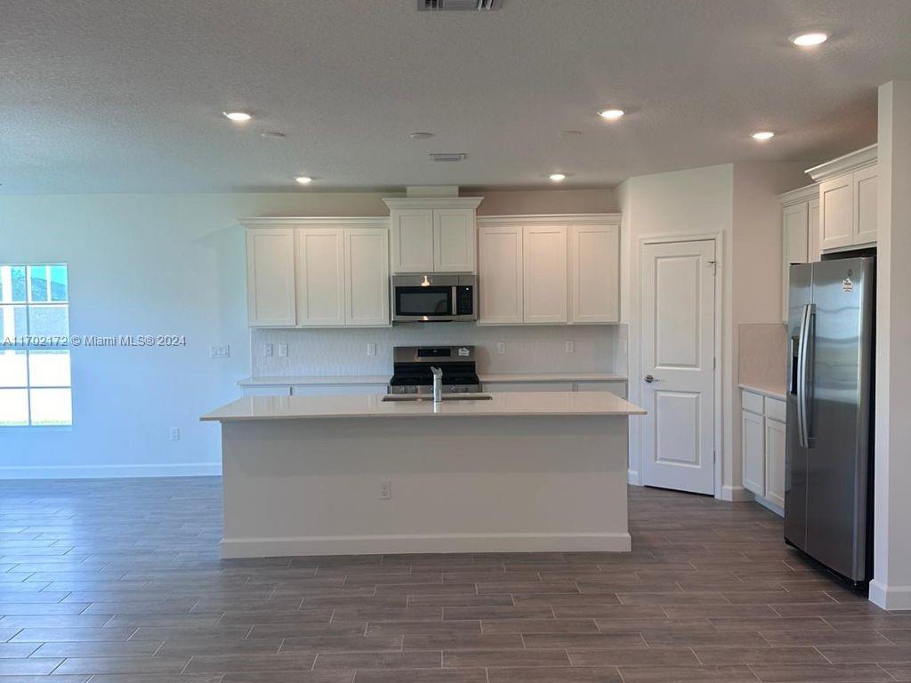 Photo of 1451 Tangled Orchard Trce, Loxahatchee, FL 33470 (MLS # A11702172)