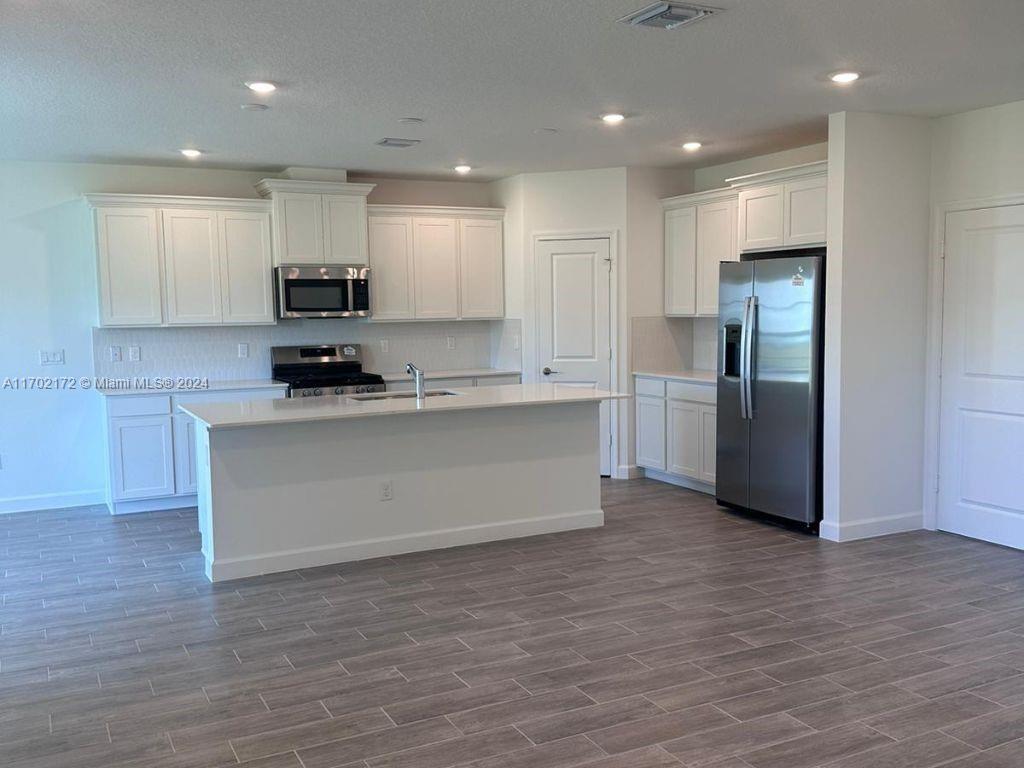 Photo of 1451 Tangled Orchard Trce, Loxahatchee, FL 33470 (MLS # A11702172)