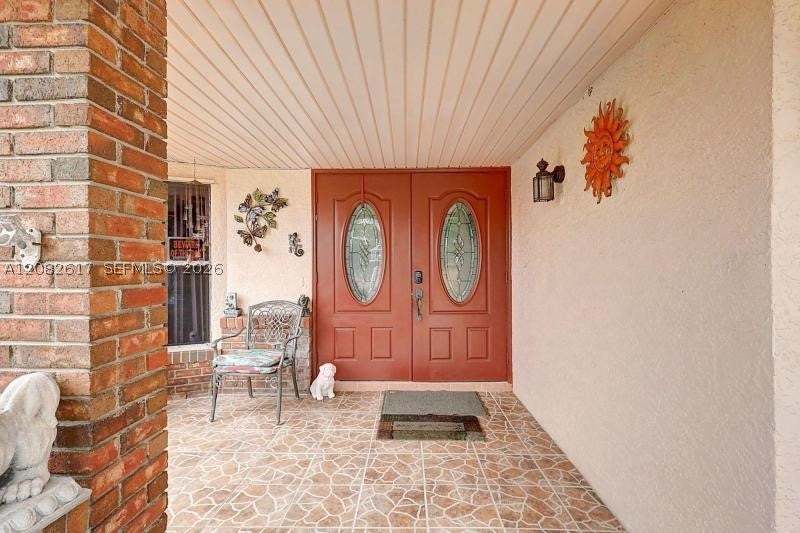 Photo of 412 SW Sansom Ln, Port St Lucie, FL 34953 (MLS # A12082617)
