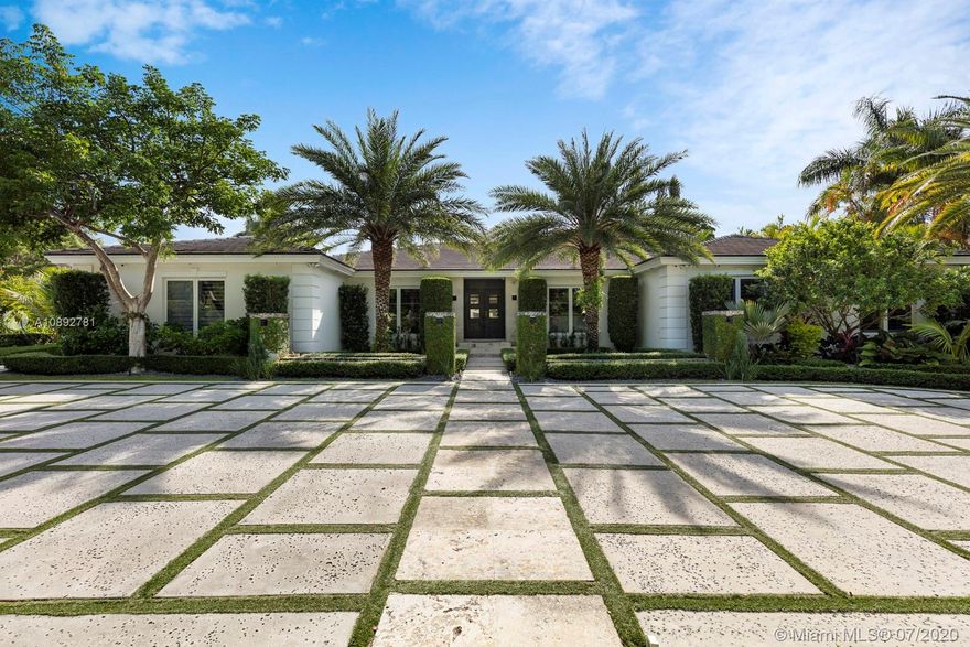 Once in a long while a spectacular offering comes to market  that is perfect for enjoying Florida living at its best!  Such is the case with this 5 bedroom, sleek, traditional on the outside, but totally 21st century on the inside home on a highly desired corner lot!  With some 6,000+ s.f., this beautiful open floor plan accommodates the most discriminating buyers.  Not only does the home have a media room/movie theater, it boasts a playroom, 2 car air conditioned garage, lavish master suite, gourmet cook’s kitchen and much, much more. The 25,000+ s.f lot provides the perfect backdrop for the inviting pool and surrounding gardens.  No detail has been overlooked in making this a home everyone will love.