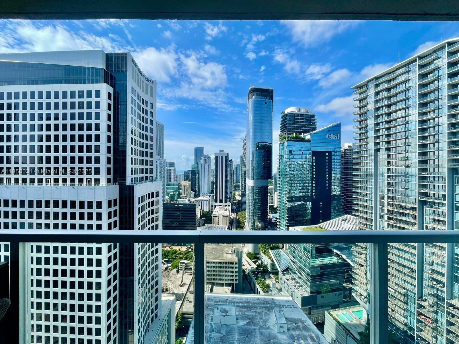 Excellent location in Brickell. Panoramic City, and River views. Corner Unit. Best split floor plan. Large kitchen with quartz counter tops & stainless steel appliances. Double vanities with marble tops and Jacuzzi in master bathroom, glass enclosed showers. California Closets. Brand new floor. Parking Spot located in the second floor garage. Beautiful amenities include 3 pools, spa & gym, club room, sports bar, roof top entertainment room, theater room.