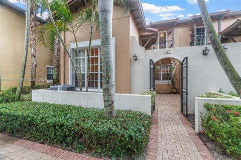 Photo of 839 SW 147th Ter #5, Pembroke Pines, FL 33027 (MLS # A11945777)