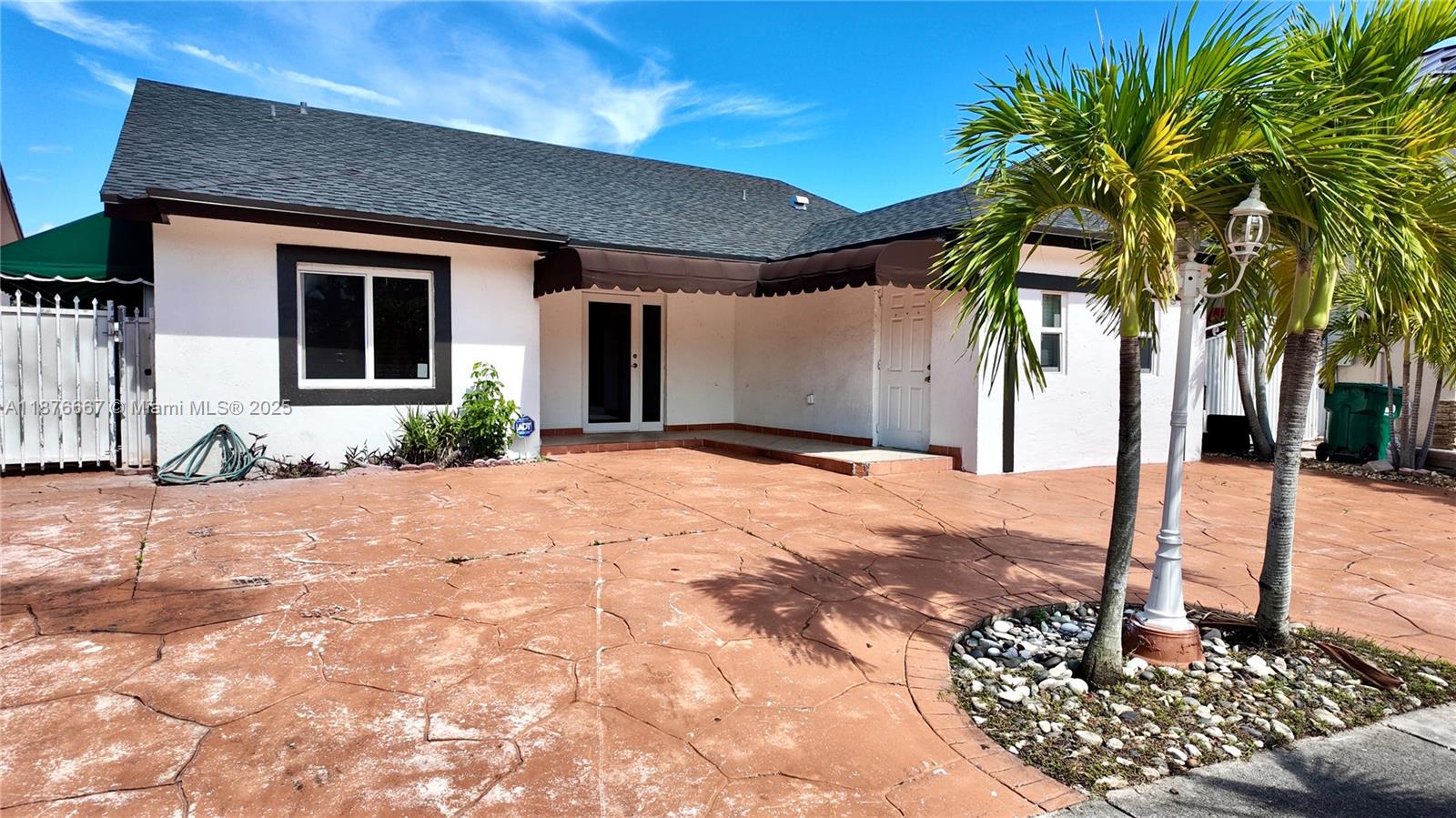 PRIME MIAMI LOCATION – SINGLE FAMILY WITH LAKE VIEWS! Rare 4BR/3BA home split into a 3/2 plus a 1/1 with private entrance, offering independence for multigenerational living or excellent rental income potential. Enjoy stunning lake views, top-rated nearby schools, and unmatched convenience. Walking distance to shopping and markets, with easy access to major roads and Miami’s top amenities. Located in a quiet, family-friendly neighborhood with an excellent safety record—perfect blend of lifestyle, comfort, and opportunity.