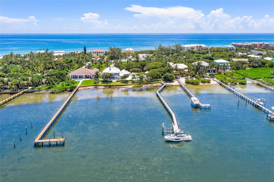 Welcome to IL Santuario (The Sanctuary) set on a 2.78 acre (double) intracoastal lot with ~5'-6' of deep water, ocean access & 235 ft of waterfront. Home has desirable Open Floor Plan w/ large Master Suite on First Floor, and three other en-suite bedrooms on the second level. The interior of the home has been virtually staged/renovated and is ready for your own personal touches. Property features Resort Style Pool w/ Spa, Water Feature and even a Splash/Kiddie Pool! Newer dock features Trex Decking, water, electric and a 30K LB Quick Boat Lift. Property is near the Virginia Beach public access on South Hutchinson Island, just a short walk or golf cart ride away.