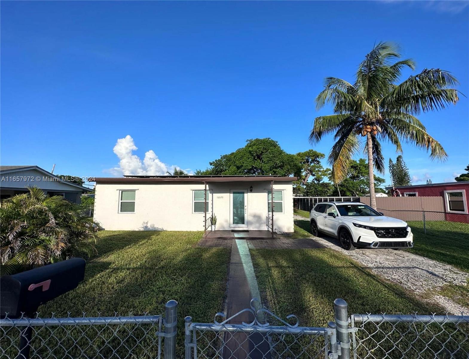 Remodeled 3-bedroom, 1-bath single family house in Bunche Park, Miami Gardens. The house features a brand new 2.5 RUUD by Rheem 16 SEER high efficiency air conditioner with new ducts, new eco impact windows and doors, electrical panel upgrade to 200 amps, HVAC solar panels, EV charger at 60 amps and outlet for two EV charging stations, new kitchen cabinets, laminated wood floors throughout, new washer and dryer, and a huge fenced yard. No HOA.