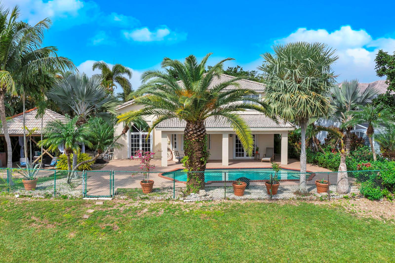 Here it is! The one you've been waiting for! Discover your very own resort-style living right in your backyard! Covered terrace overlooking the pool AND a large gazebo great for gathering with friends. Enjoy unobstructed lake views from the entire backyard. Relax every evening with stunning sunset views. This spacious 4 bedroom, 3 full bath home has it all, offering a spacious layout with lake views from the kitchen, family & dining room. Beautifully remodeled kitchen with a charming bay window perfect for enjoying a cup of coffee while admiring your outside oasis. Four large bedrooms are located upstairs + a loft that could easily serve as a 5th bedroom. Situated on an oversized lot- plenty of space for parking + 2 car garage. Shopping, dinning & West Kendall Baptist all within 2 miles