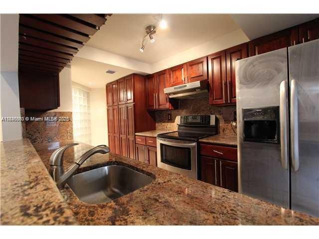 Experience modern living in this beautifully updated condo located in the heart of Aventura. This bright and spacious unit offers 2 bedrooms and 2 bathrooms, an elegant kitchen with stainless steel appliances, and stylish finishes throughout. Enjoy the convenience of a private in-unit washer and dryer—a rare find in the area. Residents benefit from exclusive access to the Waterways Marina, a serene community pool, and lush walking paths. Ideally located near top-rated schools, Aventura Mall, Whole Foods, and the scenic Turnberry trail.