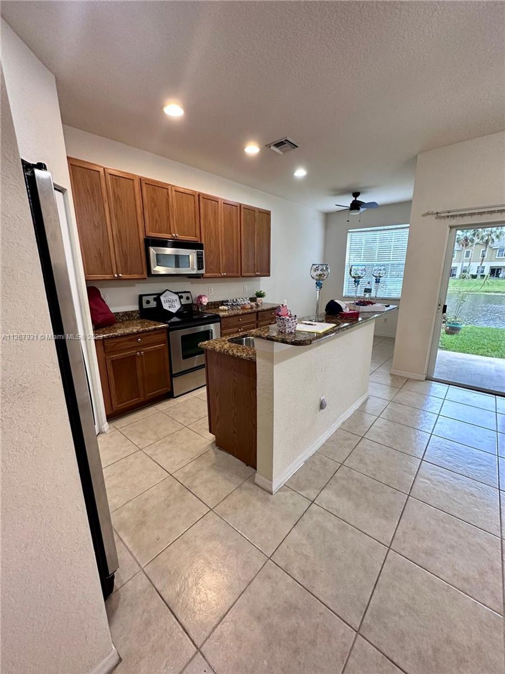 Photo of 1550 SE Sheffield Ter #103, Stuart, FL 34994 (MLS # A11267931)