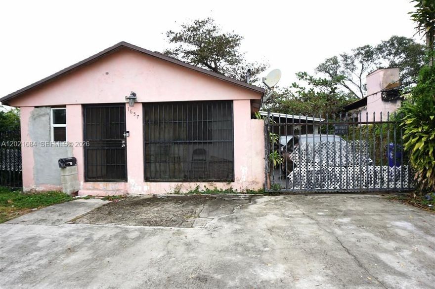 Full Rehab needed on this Investor Special 3Bed/4Bath house-Solid Cement Block Construction. Crrently being used as a 2Bed/3Bath with an attached 1Bed/1Bath apt.  Can easily be converted into a Triplex with private entry zoned multifamily. Nice large bedrooms each with own bathroom/walkin closet.  Needs full rehab but priced way below market- This property is in major area of growth as several houses behind property are all renovated/new houses that have sold in the last month providing nice after repair comps.  Great location-Only 12 Minutes to the Design District, 15 Minutes to Downtown Miami (Courthouse Area), and only 11 Minutes to Wynwood and Midtown.  Looking for a cash buyer that is seeking their next renovation project within the city of Miami.