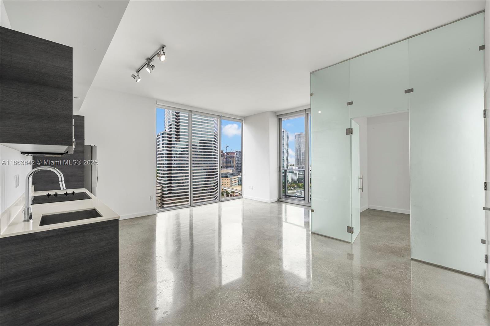 Spacious and modern corner 2BD/2BA unit at CENTRO in the heart of Downtown Miami. Enjoy stunning panoramic views of the skyline facing south and west through floor-to-ceiling windows. Features include an open kitchen with quartz countertops and stainless steel appliances, split-bedroom layout with large closets, and sleek contemporary finishes. Building offers 24/7 front desk, valet, fitness center, sauna, steam room, game lounge, and a rooftop pool with breathtaking views. Walk to Brickell, Bayside, the MetroMover, restaurants, and shops. Please note: no parking space included.