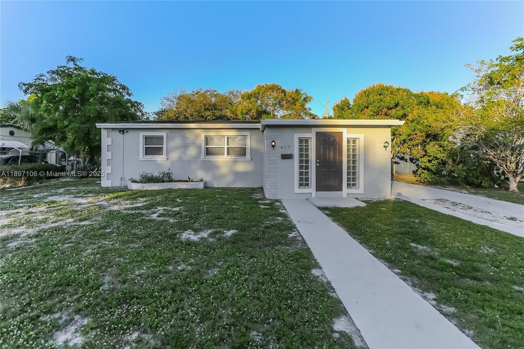 Photo of 417 SW 22nd Ter, Fort Lauderdale, FL 33312 (MLS # A11897106)