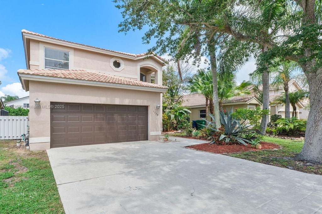Photo of 5228 NW 112th Ter, Coral Springs, FL 33076 (MLS # A11843679)