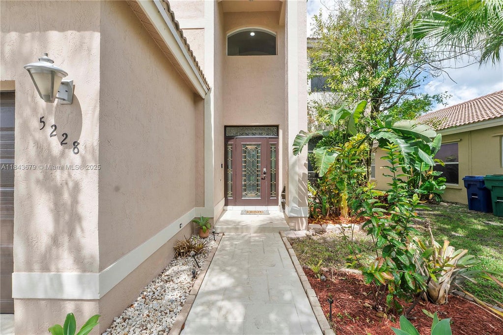 Photo of 5228 NW 112th Ter, Coral Springs, FL 33076 (MLS # A11843679)